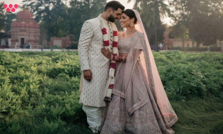a soft forehead wedding photography pose for couple